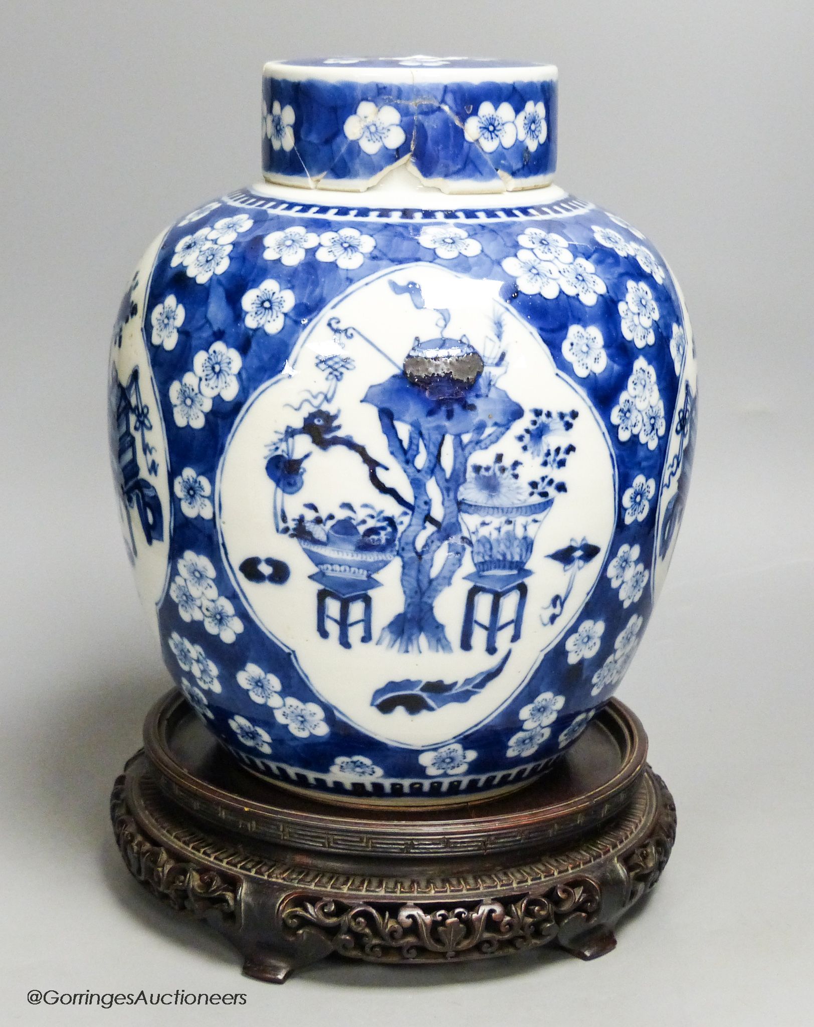 A Chinese blue and white 'Hundred Antiques' jar, Kangxi mark, c.1900